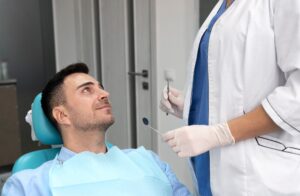 Patient consultation at Tenerife dental clinic during professional dental examination